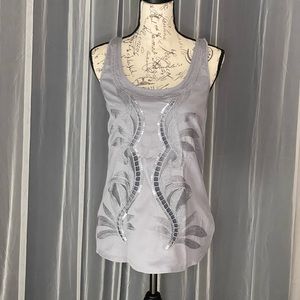 Express woman’s silver embellished tank top
